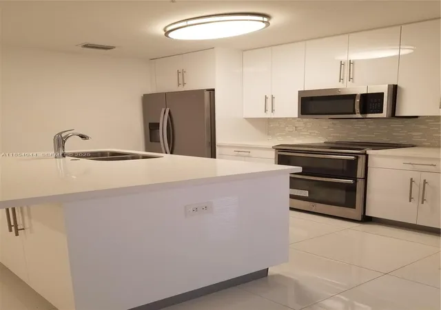 2651-ne-212th-ter-103-miami-fl-33180/hzid_6a979298