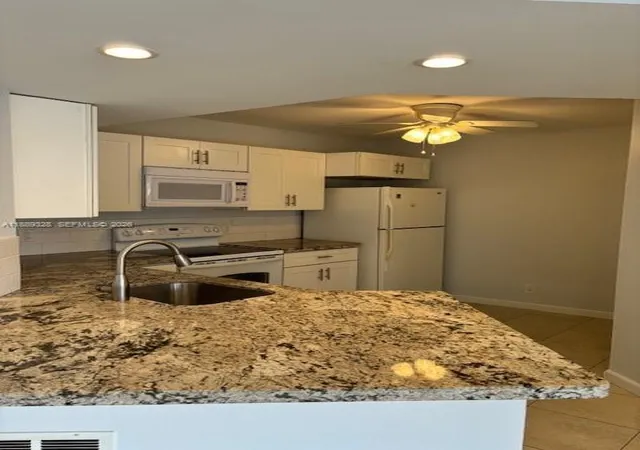 8977-wiles-rd-103-coral-springs-fl-33067/hzid_2aab93ce