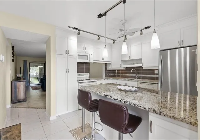 6095-n-sabal-palm-blvd-210-tamarac-fl-33319/hzid_1bc05a0e