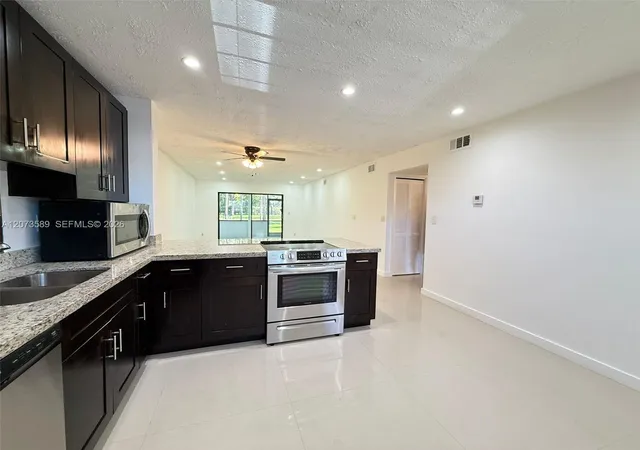 6095-n-sabal-palm-blvd-103-tamarac-fl-33319/hzid_47aab1c3