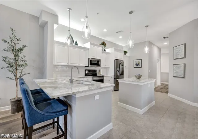 8661-piazza-del-lago-cir-204-estero-fl-33928/hzid_e47d2de3