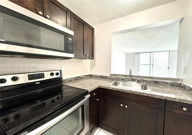 484-nw-165th-st-rd-a-411-miami-fl-33169/hzid_c20ff428
