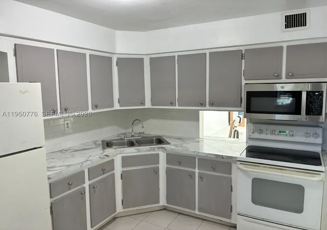 1450-ne-191st-st-205-miami-fl-33179/hzid_a45162de