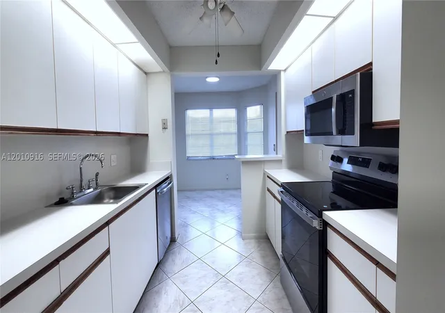 901-sw-128th-ave-311e-pembroke-pines-fl-33027/hzid_0f9cf5b7