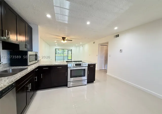 6095-n-sabal-palm-blvd-103-tamarac-fl-33319/hzid_47aab1c3